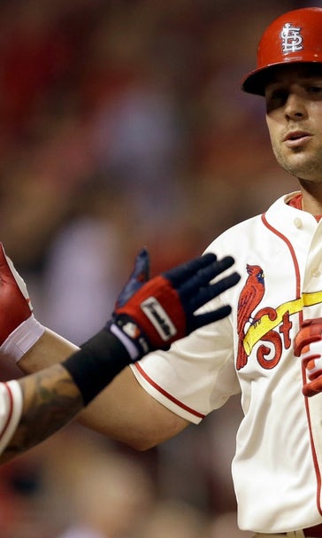Cardinals pound Cubs 13-2 to split doubleheader